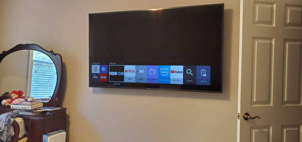Wall-Mounted TV